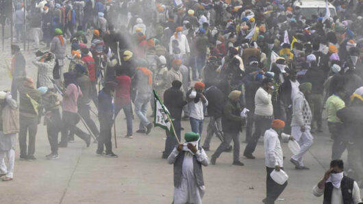 Indian police fire tear gas at farmers